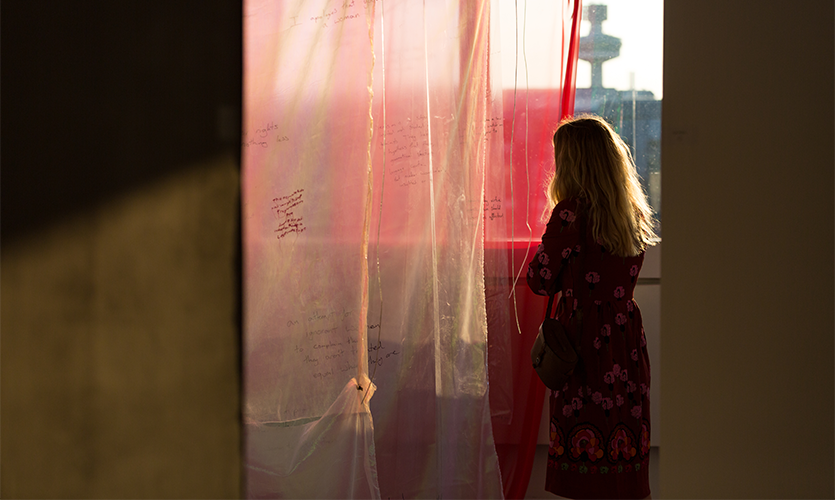 Woman standing at one of the exhibits