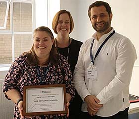 Jane Dowson accepting an award from Associate Professor Claire Lindsay of the BAM Operations, Logistics and Supply Chain Management Special Interest Group.