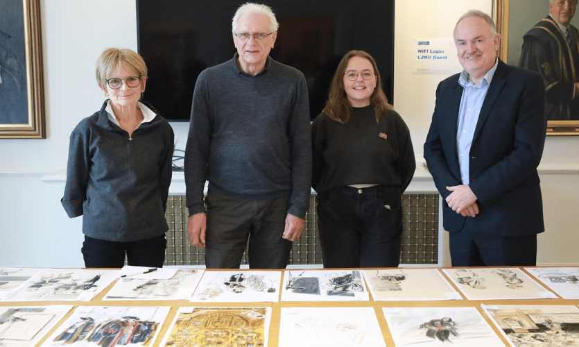 Julia, Bryan, Madeleine and Vice-Chancellor Mark Power all stood behind a table full of sketches 